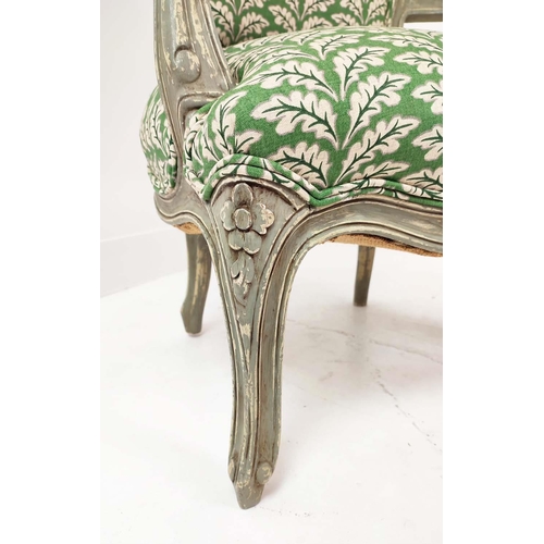 155 - FAUTEUILS, a pair, Louis XV style, grey painted with green leaf patterned upholstery, 92cm H x 54cm ... 