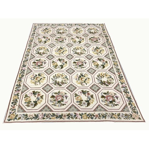 101 - NEEDLEPOINT WOOLEN CARPET, 273cm x 193cm, Cream-coloured ground inset with floral-sprigs within tile... 