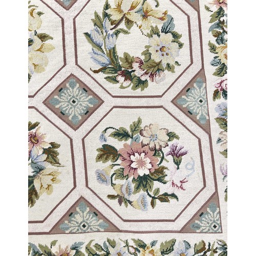 101 - NEEDLEPOINT WOOLEN CARPET, 273cm x 193cm, Cream-coloured ground inset with floral-sprigs within tile... 