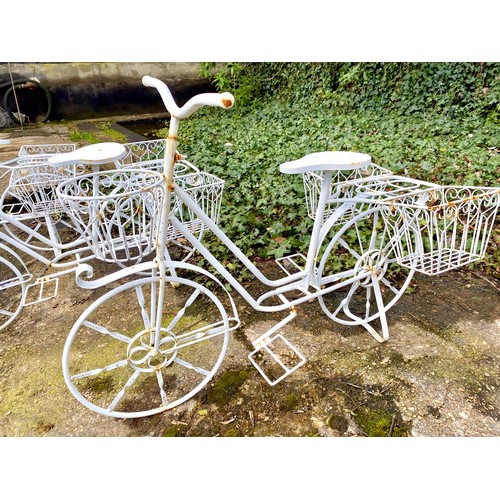 320 - BICYCLE PLANTERS, a set of four, white painted metal, 63cm H x 88cm x 44cm. (4)