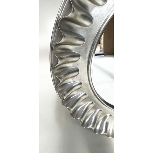 255 - WALL MIRROR, large circular wavy silvered frame, 112cm W.