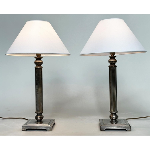 189 - TABLE LAMPS, a pair, silvered metal each with reeded column, and square bases (with shades), 66cm H.... 