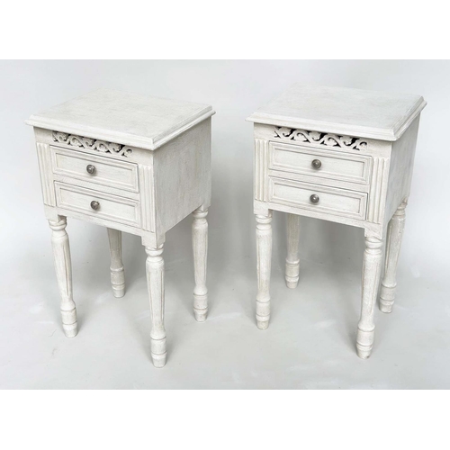 191 - BEDSIDE CHESTS, a pair, French style traditionally grey painted each with two drawers, pierced friez... 