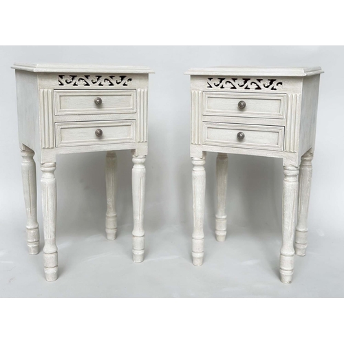 191 - BEDSIDE CHESTS, a pair, French style traditionally grey painted each with two drawers, pierced friez... 