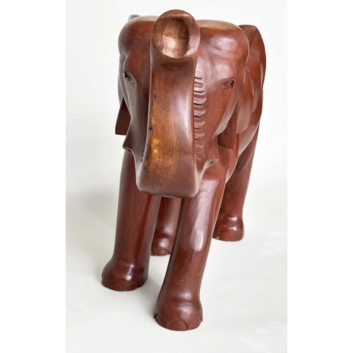 197 - ELEPHANT, Indian carved well patinated solid elm, 83cm W x 63cm H.