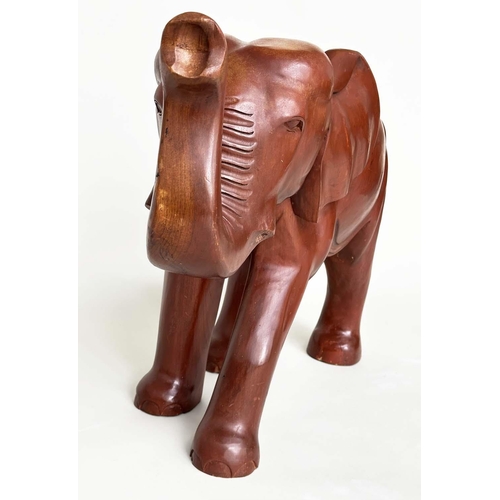 197 - ELEPHANT, Indian carved well patinated solid elm, 83cm W x 63cm H.