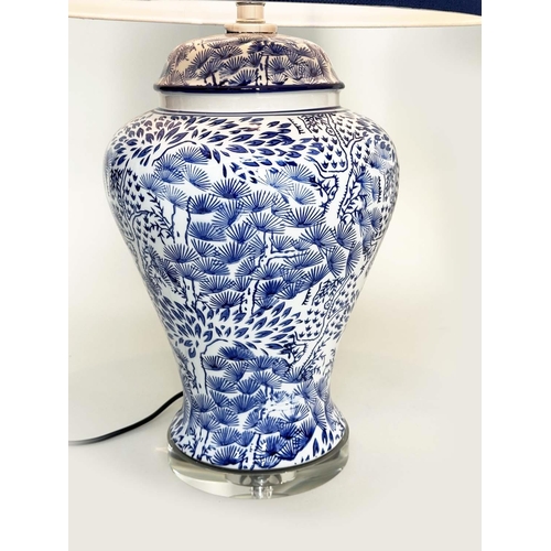 221 - TABLE LAMPS, a pair, Chinese fern blue and white ceramic of lidded vase form with lucite bases and s... 