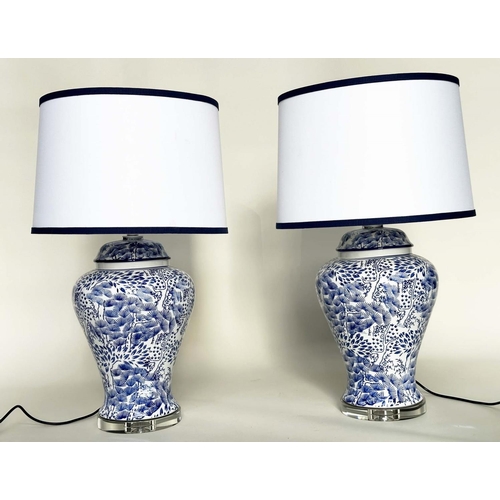 221 - TABLE LAMPS, a pair, Chinese fern blue and white ceramic of lidded vase form with lucite bases and s... 