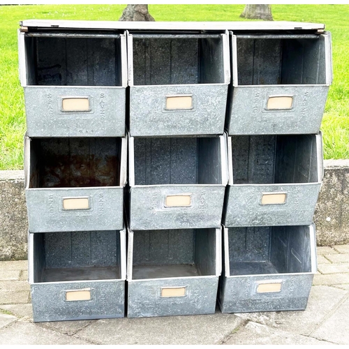 275 - STACKING TRAYS, a set of nine, galvanised with softwood work top, 90cm x 50cm x 91cm H.