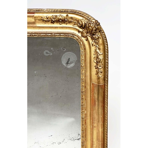 109 - WALL MIRROR, 19th century French Napoleon III giltwood and gesso moulded, arched with foliate corner... 