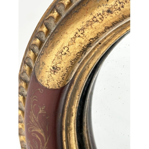 113 - VENETIAN WALL MIRORR, early 20th century giltwood, circular with convex mirror plate and hand painte... 