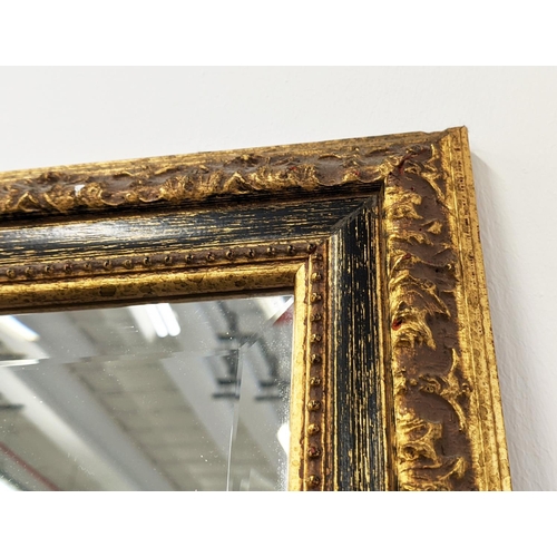 245 - LARGE MIRROR, gilt frame with a bevelled plate, 105cm W x 212cm H.