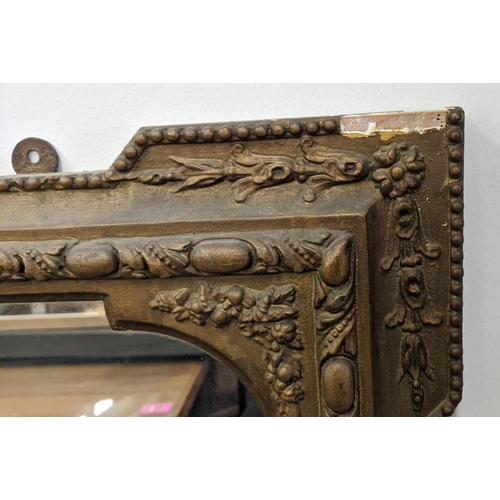 246 - OVERMANTEL MIRROR, late Victorian with a decorative gilt frame, 103cm W x 145cm H.