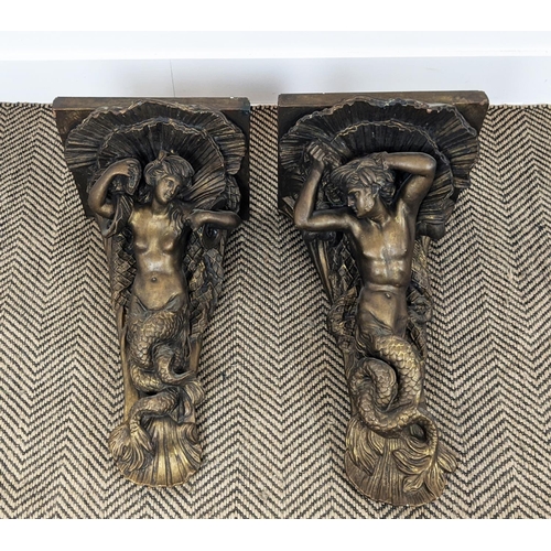 247 - WALL BRACKETS, a pair, plaster with gilt finish, depicting a mermaid and merman, each 57cm H x 52cm.... 