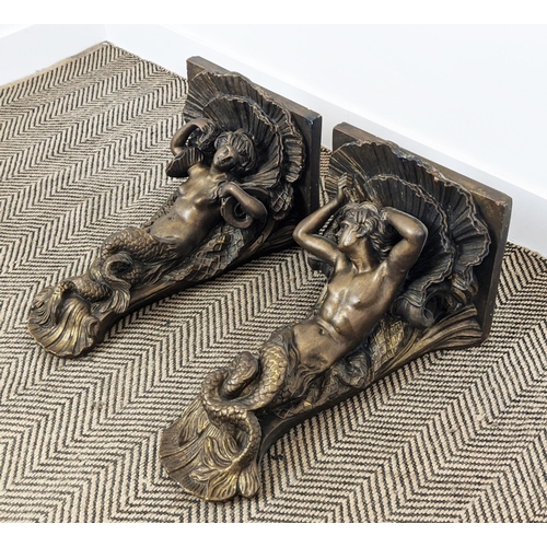 247 - WALL BRACKETS, a pair, plaster with gilt finish, depicting a mermaid and merman, each 57cm H x 52cm.... 