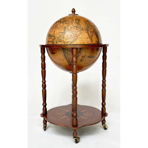 287 - GLOBE COCKTAIL CABINET, in the form of an antique terrestrial globe on stand with rising lid and fit... 