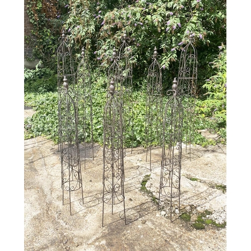 359 - ARCHITECTURAL GARDEN OBELISKS, a set of nine, in metal, graduated sizes. (9)