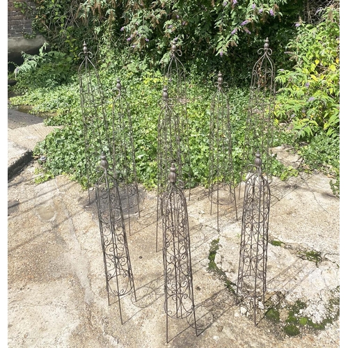 359 - ARCHITECTURAL GARDEN OBELISKS, a set of nine, in metal, graduated sizes. (9)