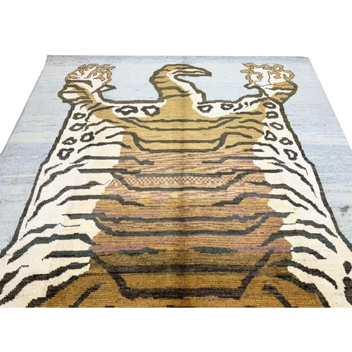 81 - TIBETAN TIGER CARPET, 291cm x 204cm.