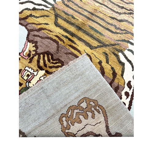 81 - TIBETAN TIGER CARPET, 291cm x 204cm.