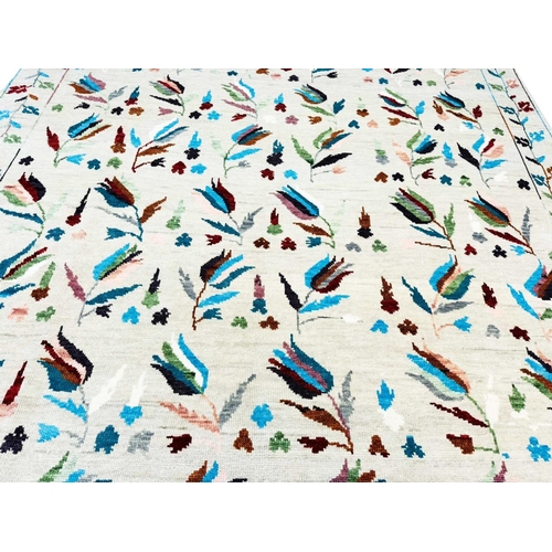 82 - FINE SUZANI TULIP DESIGN CARPET, 300cm x 237cm.