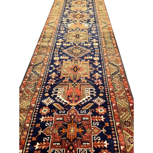 95 - PERSIAN HERIZ LONG RUNNER, 448cm x 85cm.