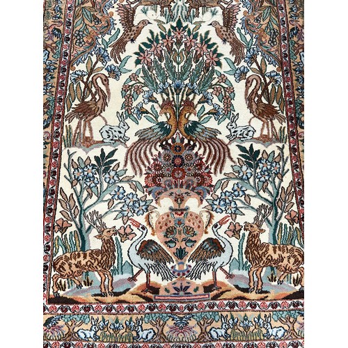 88A - PICTORIAL RUG, 181cm x 117cm.