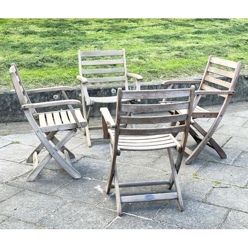 137 - GARDEN ARMCHAIRS BY ALEXANDER ROSE, a set of four, nicely weathered teak each folding with arms, Sus... 