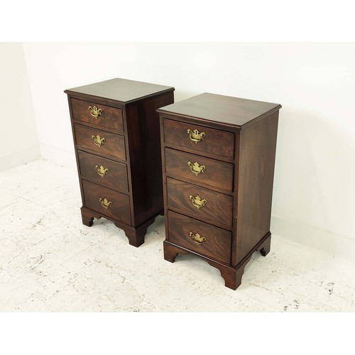 147 - BEDSIDE CHESTS, a pair, late 19th/early 20th century mahogany, labelled S & H Jewel of four drawers,... 