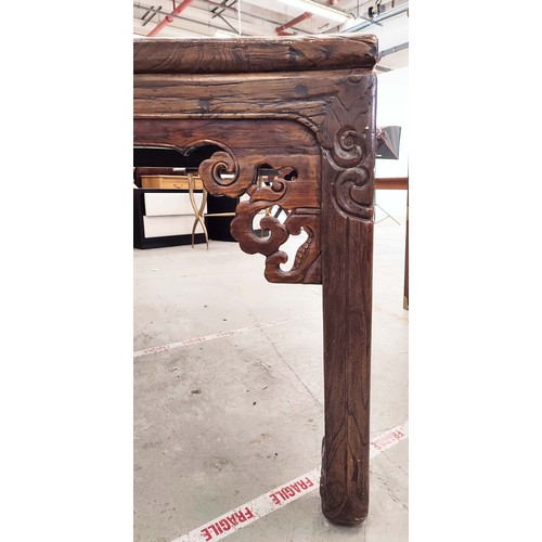 184 - DINING TABLE, Chinese elm with carved legs and pierced spandrels, 217cm L x 107cm W x 88cm H.