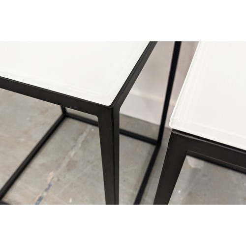 426 - SIDE TABLES, a pair, 40cm x 40cm x 55cm, frosted glass tops, on black painted metal supports. (2)