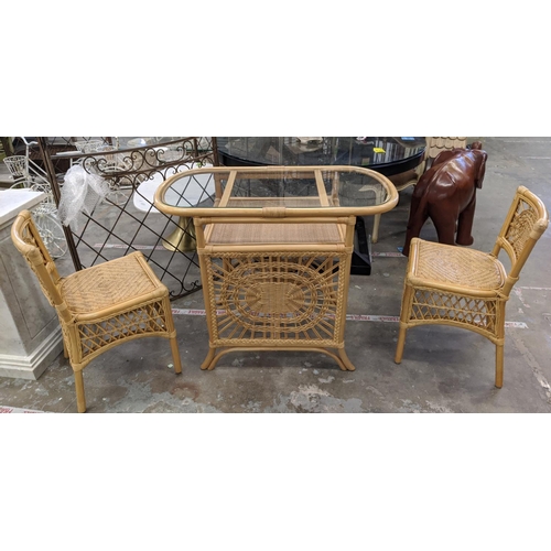 448 - TERRACE SET, wicker table with glass top, 80cm H x 100cm x 55cm and a pair of matching chairs. (3)