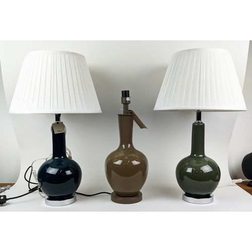 457 - OKA TABLE LAMPS, a pair, 71cm H with one other. (3)