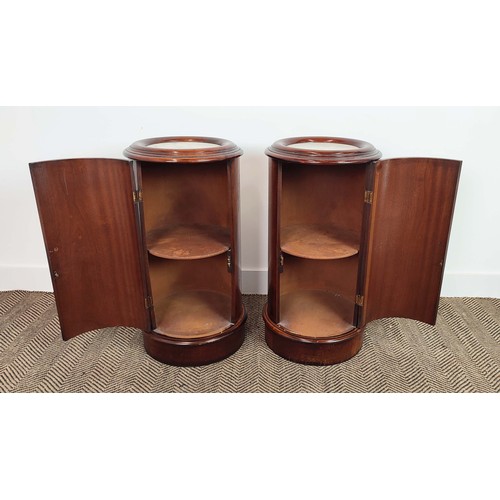 459 - VICTORIAN STYLE MARBLE TOPPED MAHOGANY POT CUPBOARDS, a pair, of cylindrical form, single door, 73cm... 