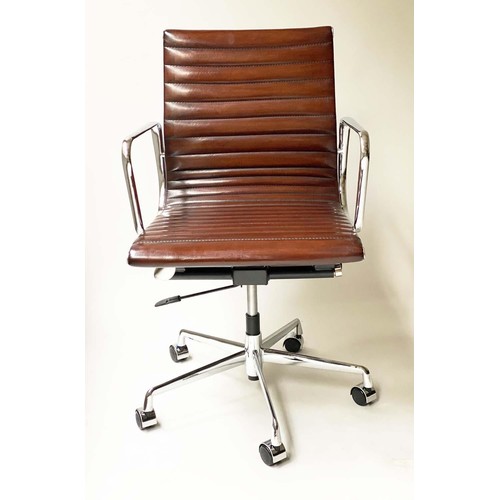 125 - REVOLVING DESK CHAIR, Charles and Ray Eames inspired with ribbed hand finished mid brown natural lea... 