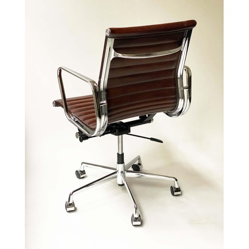 125 - REVOLVING DESK CHAIR, Charles and Ray Eames inspired with ribbed hand finished mid brown natural lea... 