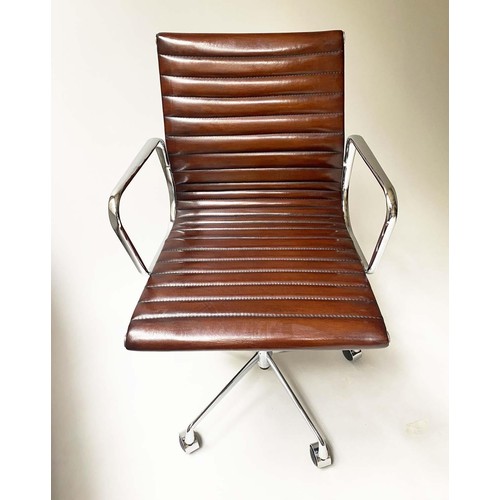 125 - REVOLVING DESK CHAIR, Charles and Ray Eames inspired with ribbed hand finished mid brown natural lea... 