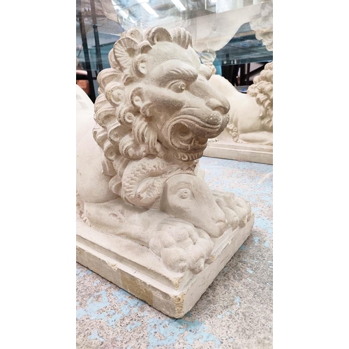 446 - LOW TABLE, twin composite stone lion bases, glass top, 122cm x 122cm x 42.5cm.