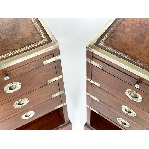 124 - CAMPAIGN STYLE CHESTS, a pair, mahogany and brass bound with tooled leather and three drawers, 58cm ... 