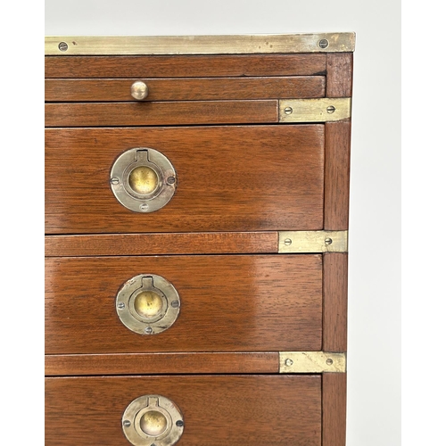 124 - CAMPAIGN STYLE CHESTS, a pair, mahogany and brass bound with tooled leather and three drawers, 58cm ... 