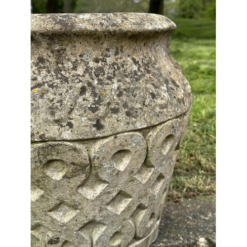 131 - GARDEN PLANTERS, a pair, well weathered reconstituted stone studio pots of urn form, 39cm H x 42cm W... 