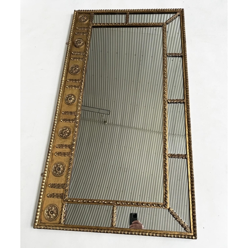 140 - WALL MIRROR, Regency design giltwood and gesso with rosette frieze and marginal mirror plates, 135cm... 