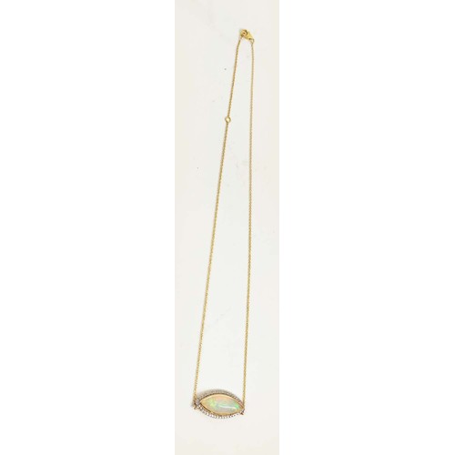 29 - A 14CT GOLD OPAL AND DIAMOND SET PENDANT NECKLACE, the cabouchon opal surrounded by round brilliant ... 