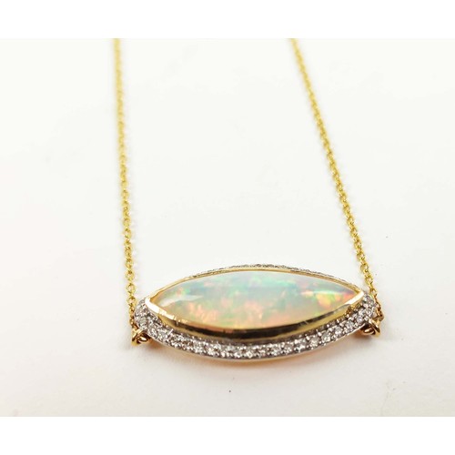 29 - A 14CT GOLD OPAL AND DIAMOND SET PENDANT NECKLACE, the cabouchon opal surrounded by round brilliant ... 