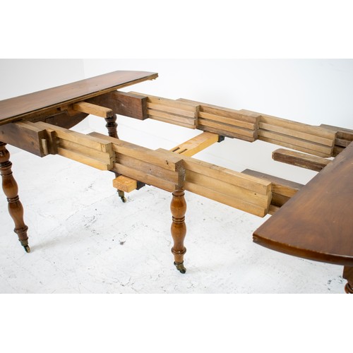 251A - DINING TABLE, mid 19th century French walnut with drop flaps, two extra leaves and removable centre ... 