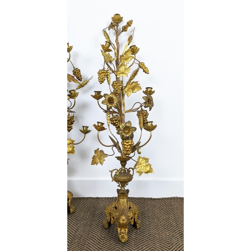 25 - TABLE CANDLABRAS, a pair, each 107cm H x 33cm W, gilt metal with grain and grape detail, with candle... 