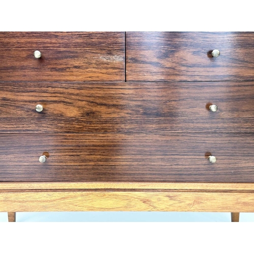 595 - UNIFLEX CHEST, mid 20th century teak with two short and two long drawers, 74cm H x 92cm x 46cm.