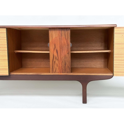 597 - SIDEBOARD, mid 20th century teak with two doors and three drawers, 166cm x 40cm x 75cm H.