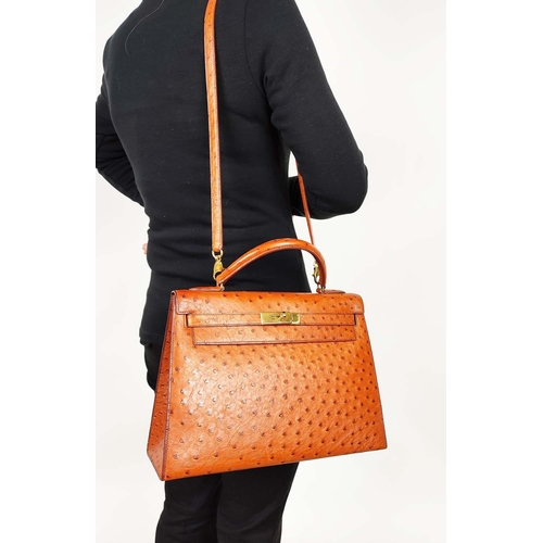 14 - HERMÈS KELLY SELLIER 32 OSTRICH, gold tone hardware, top handle, color matching leather lining, one ... 