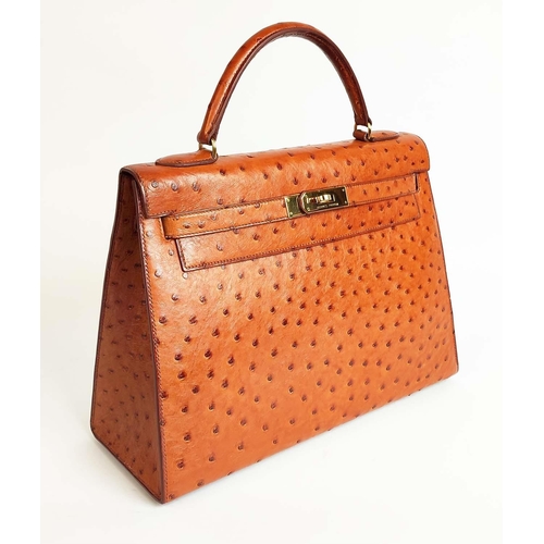 14 - HERMÈS KELLY SELLIER 32 OSTRICH, gold tone hardware, top handle, color matching leather lining, one ... 